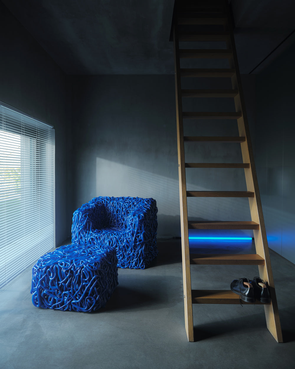 Senzafine – poltrona / pouf – ambientata